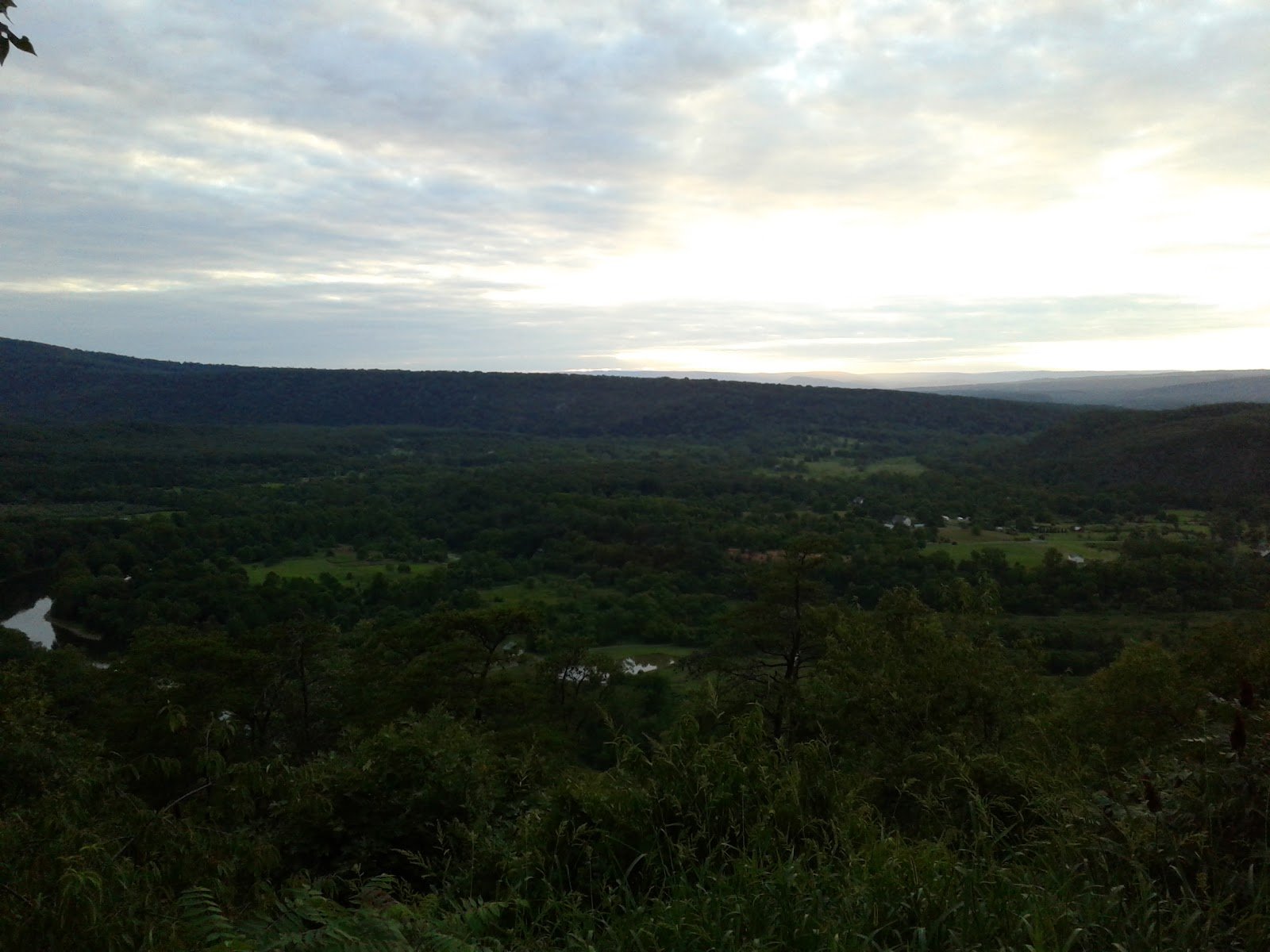 A storm rolling through the river valley, seen from the overlook on the final approach to the property.
