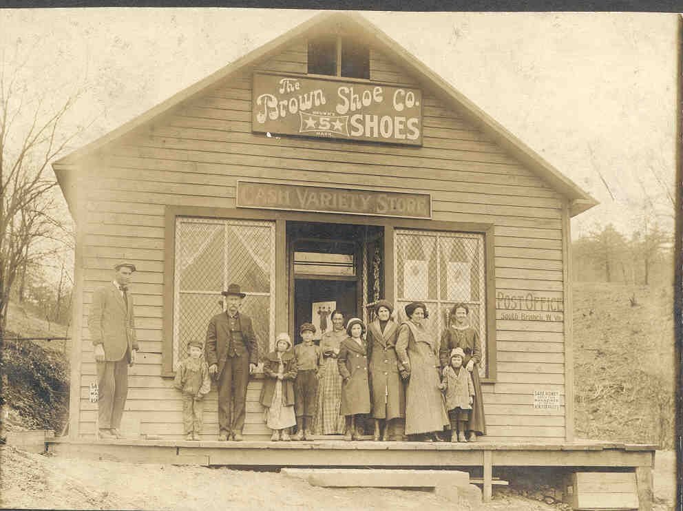 Circa 1910 photograph of a Frenches Station family outside the Cash Variety Store and post office.